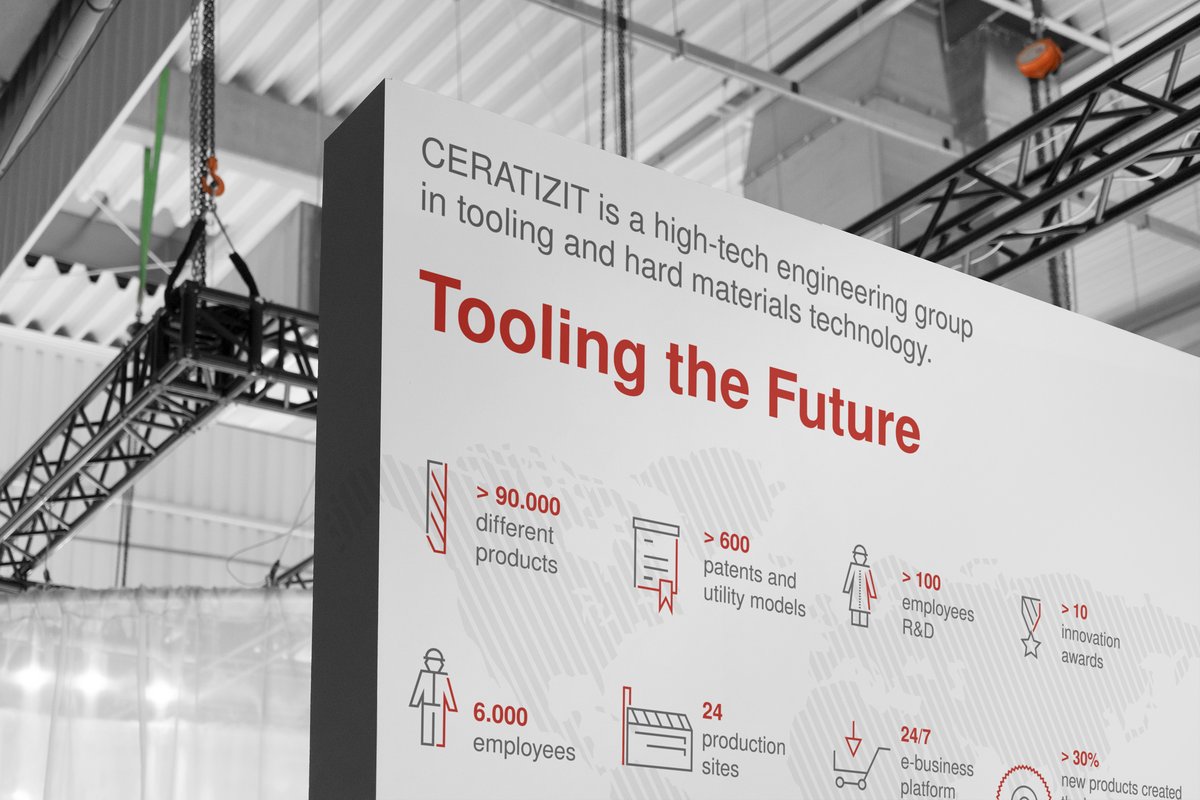 Wall showing "tooling the future" at a conference event