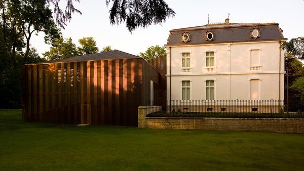 The Villa Vauban and the garden at sunset