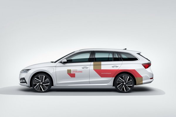 A white car (Skoda) that feature Leudelange corporate identity